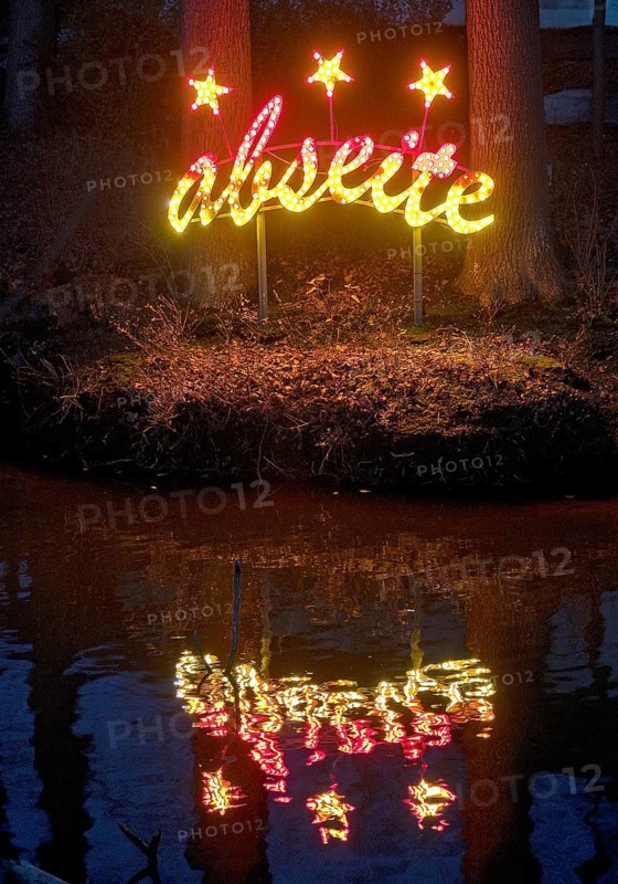 The river Lippe at the Marineverein with the artwork by Jan Philip Scheibe at night, Lichtpromenade Lippstadt, North Rhine-Westphalia, Germany