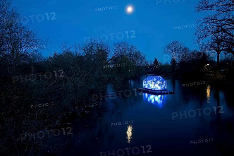 The river Lippe with the artwork Arche by Christoph Hildebrand at night with full moon, Lippstadt light promenade, North Rhine-Westphalia, Germany