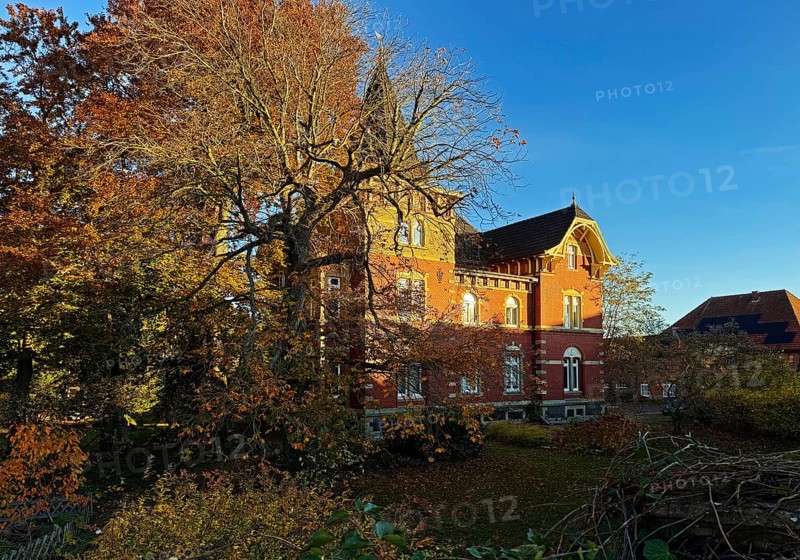 Villa-like house with garden in autumn, Lippstadt, North Rhine-Westphalia, Germany