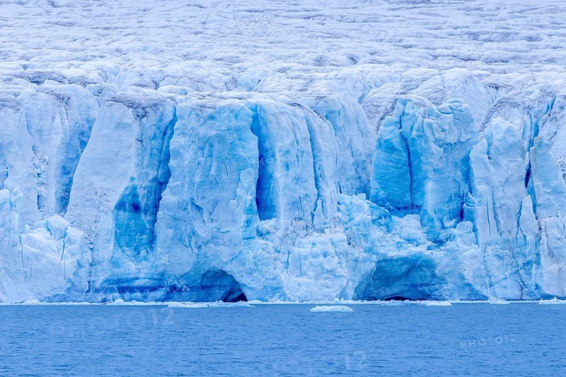 Lilliehöökbreen glacier in summer debouching into Lilliehöök Fjord, Lilliehöökfjorden, branch of Krossfjorden in Albert I Land, Spitsbergen, Svalbard