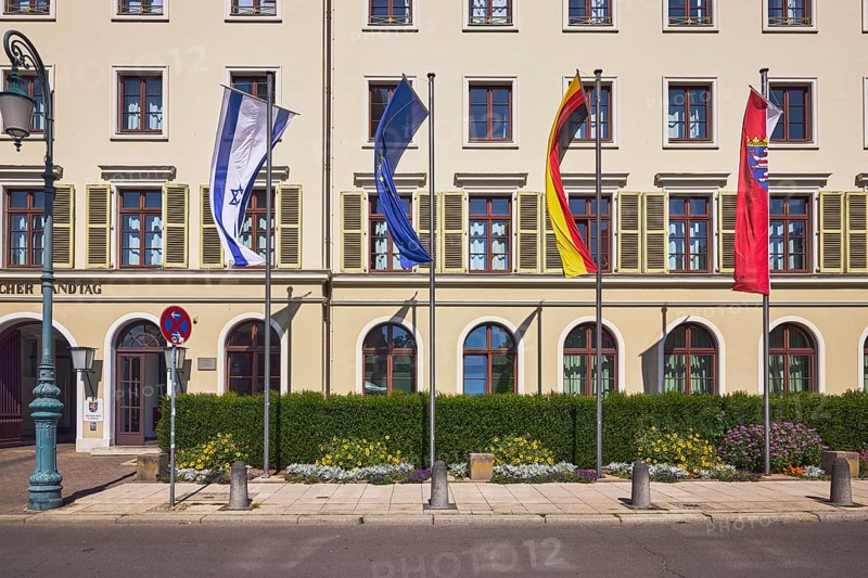 State parliament, flagpoles, flags, Israeli flag, German flag, European flag, Hesse flag, façade with windows and shutters, lantern, barrier bollard, hedge, flower bed, sunny, Schlossplatz, Wiesbaden, state capital, district-free city, Hesse, Germany