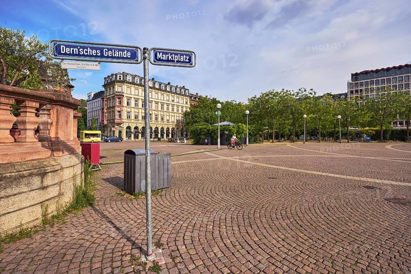Paving stone square, general architecture, historic residential and commercial buildings, sandstone wall, lantern, trees, road signs, cyclists as a secondary motif, blue sky, cumulus clouds, marketplace square and Dernsches Gelände, Wiesbaden, state capital, district-free city, Hesse, Germany