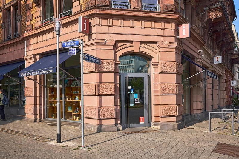Wiesbaden tourist information, historic commercial building, entrance door, door, lantern, tourist information, street signs, sunny, intersection of market square with Karl-Glässing-Straße, Wiesbaden, state capital, district-free city, Hesse, Germany