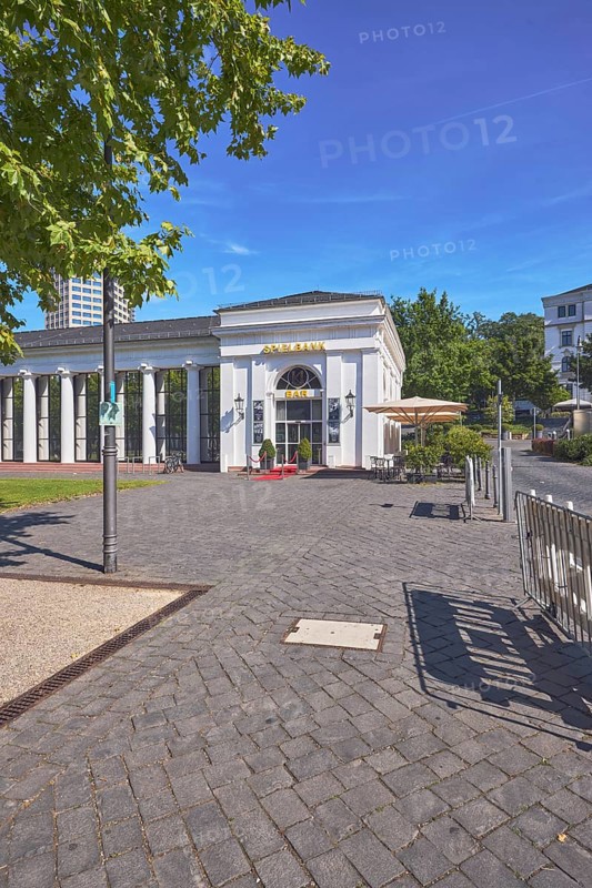 Casino, colonnades, architect Heinrich Jakob Zengerle, historic building, entrance, barrier railings, barriers, trees, lawn, blue sky, cirrus clouds, Kurhausplatz square, Wiesbaden, state capital, district-free city, Hesse, Germany