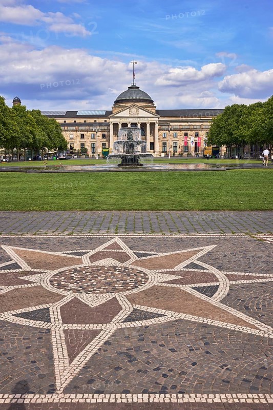 Paving stone sidewalk, mosaic, pattern, spa hotel, garden, lawn, bowling green, trees, cascade fountain, blue sky, cumulus clouds, Kurhausplatz square, Wilhelmstraße, Wiesbaden, state capital, district-free city, Hesse, Germany