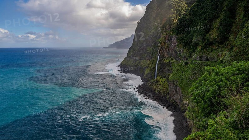 Waterfall flows into the sea, Miradouro do Véu da Noiva, Madeira, Portugal