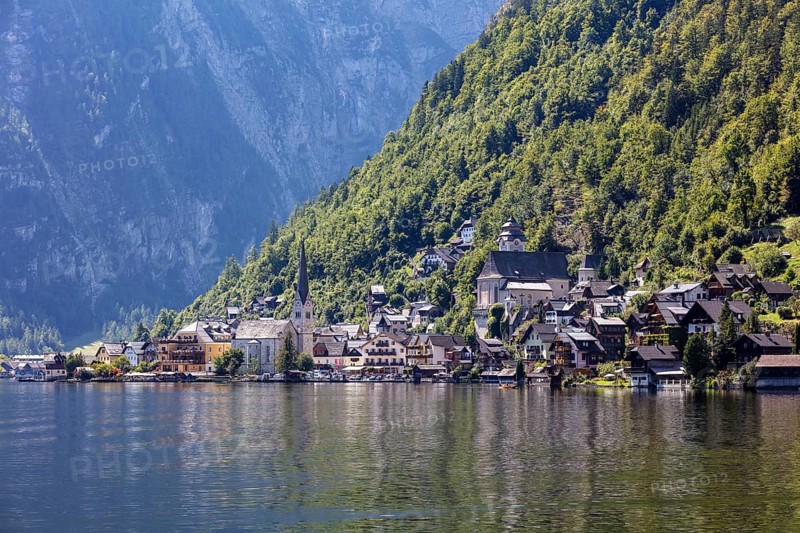 A, Hallstatt, A picturesque lakeside mountain village surrounded by steep, wooded slopes, Austria