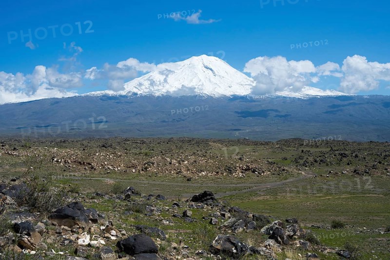 Peaceful landscape with snow-covered mountain and rocky plains under blue sky, landscape near Demirtepe, Great Ararat, Büyük Agri Dagi, Dogubayazit, Dogubayazit, Dogubeyazit, Agri Province, Eastern Anatolia, Anatolia, Turkey