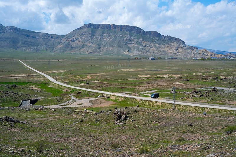 Panoramic view of a rural road winding through a vast mountain landscape, landscape near Demirtepe, Dogubayazit, Dogubayazit, Dogubeyazit, Agri Province, Agri, Eastern Anatolia, Anatolia, Turkey