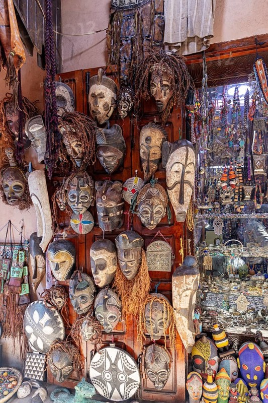 Wall with traditional African wooden masks, decorative and artistic