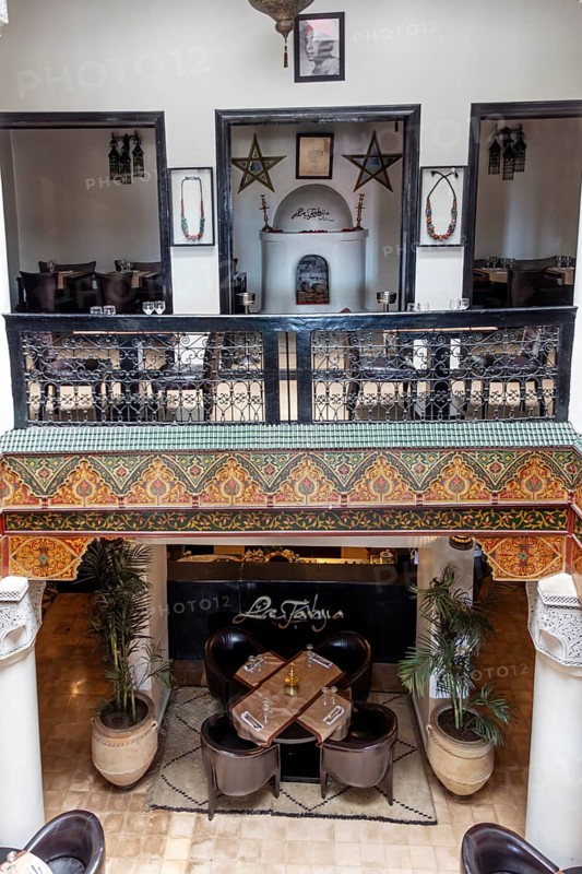 Cosy Moroccan restaurant with decorative interiors and plants