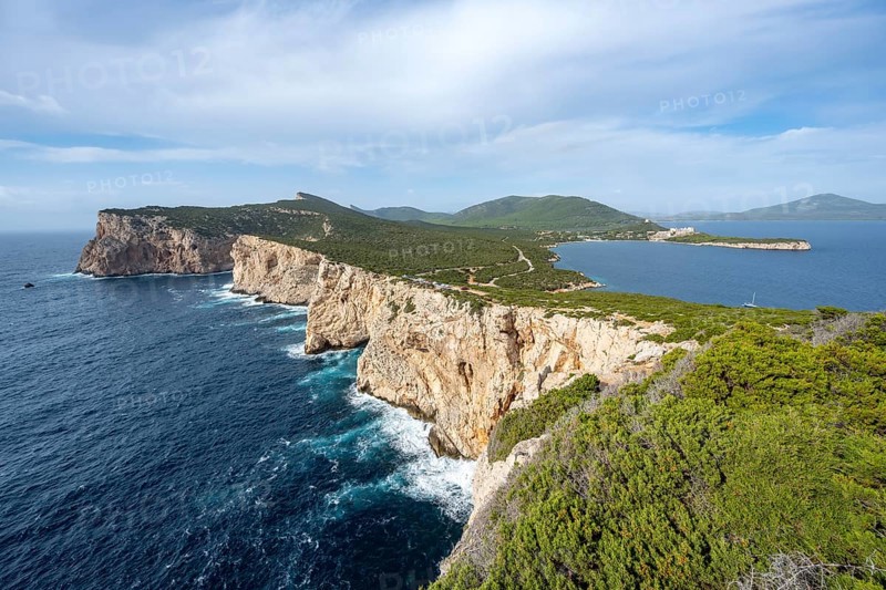 View of steep cliffs by the sea, coastal landscape, cliffs on the Capo Caccia headland, Alghero, Sardinia, Italy