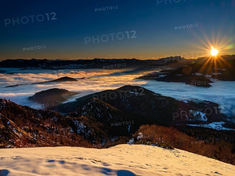 Alpine panorama at sunrise in winter, in the fog valley, Untersberg, Marktschellenberg, Berchtesgadener Land, Upper Bavaria, Bavaria, Germany