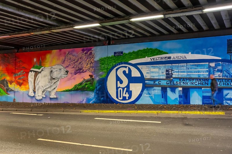 Huge street art pictures in a road tunnel in Gelsenkirchen, the approximately 120 meter long railway underpass of Wickingstraße was extensively painted and sprayed on both sides by 11 Gelsenkirchen graffiti artists and collectives, over a total length of 174 meters, the wall paintings showed motifs from Gelsenkirchen history, from economy, coal, steel, soccer, Schalke 04, culture, life, to the 150.year-old city Anniversary on 29.11.25, North Rhine-Westphalia, Germany