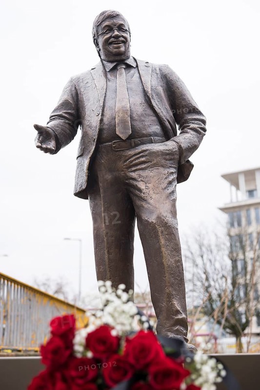 Walter Lübcke memorial with red roses and a mourning ribbon at the erection of Walter Lübcke Platz in front of the Konrad Adenauer Haus, the party headquarters of the Christian Democratic Union (CDU) on 2 December 2025. The square was erected by the Centre for Political Beauty (ZPS) and approved by the Berlin Mitte district authority for two years. Walter Lübcke was a member of the Hessian state parliament for the CDU and was murdered by an AfD supporter on 2 June 2019
