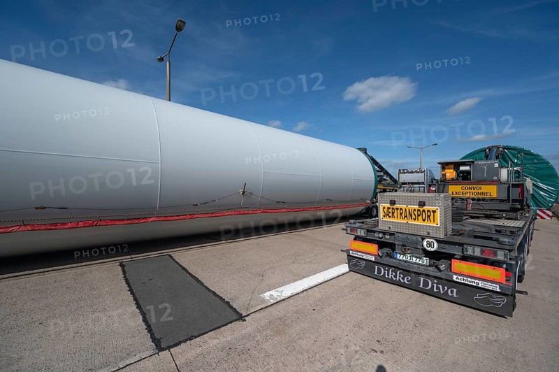 Overlong heavy-duty transporter with a part of a wind turbine, at a motorway rest area of the A9, Mecklenburg-Western Pomerania, Germany
