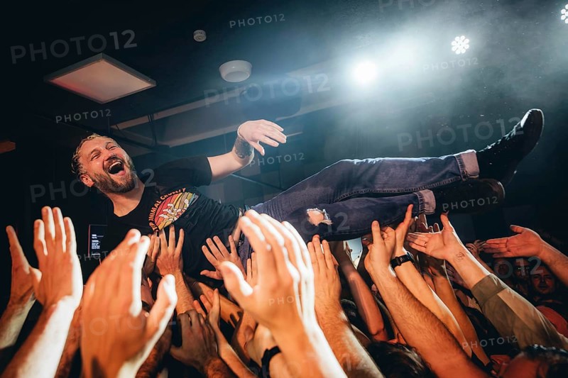 Billy Lunn, singer and guitarist from The Subways, crowd-surfing the fans live on For Eternity Tour 2025 at Hole44 in Berlin on 29.11.2025