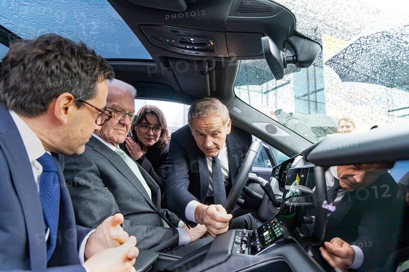 Annual event on the BW Automotive Industry Strategy Dialogue (SDA) in Stuttgart. Winfried Kretschmann, (Greens, Minister-President BW) and Stéphane Séjourné (Executive Vice President of the European Commission and Commissioner for Prosperity and Industrial Strategy) in a Porsche Cayenne. Porsche boss Oliver Blume. Automotive industry conference. Stuttgart, Baden-Württemberg, Germany