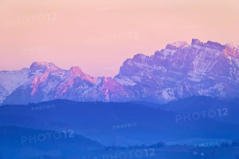 View of Zugerberg from Horben, behind it the snow-covered mountains Flübrig and Vrenelisgärtli, in the evening light, Beinwil-Freiamt, Canton, Aargau, Switzerland, Europe -