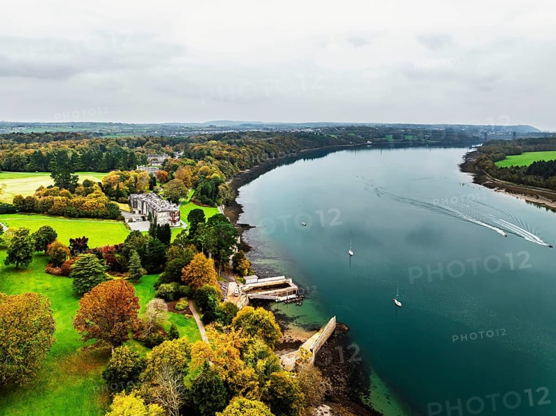 Autumn over Plas Newydd House from a drone, Gardens and Parkland, Llanfairpwllgwyngyll, Anglesey, Wales, UK