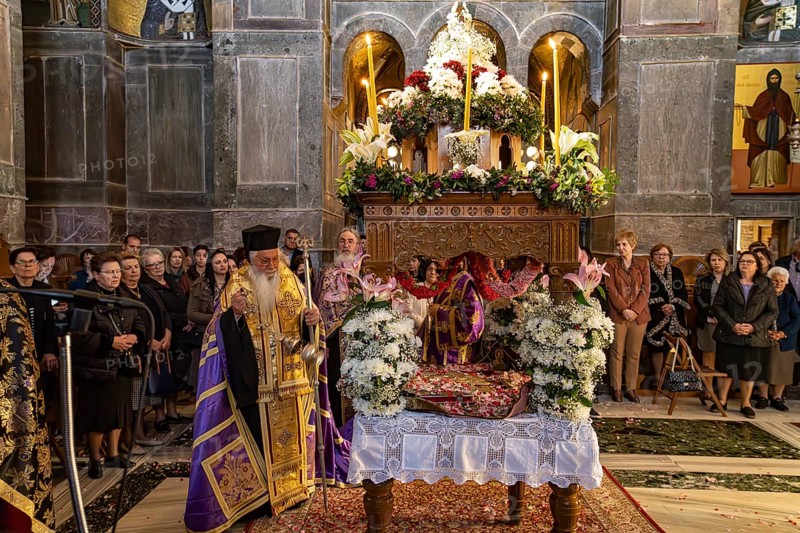 Orthodox priests at Epitaphios at Mass on Good Friday in the Catholicon of the Hosios Luke Monastery, UNESCO World Heritage Site in Steiri, Greece
