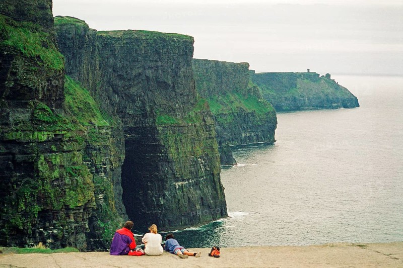 Young family, child, on the edge of a cliff, there was no fence back then, Cliffs of Moher, County Clare, Republic of Ireland, July 21, 1993, vintage, retro, old, historic