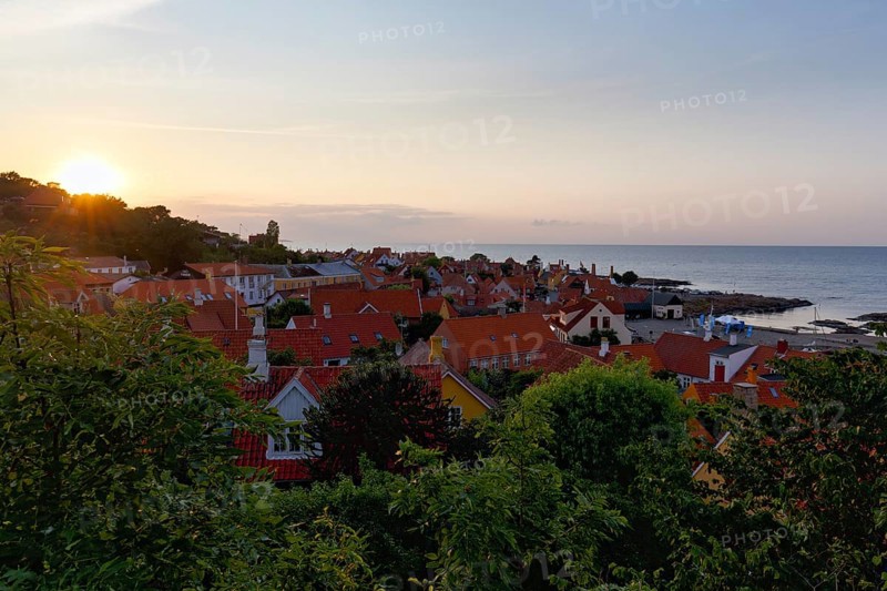 View of Gudhjem, view over the roofs of the Baltic Sea, sunset, sunbeams, Gudhjem, Bornholm, Baltic Sea, Denmark