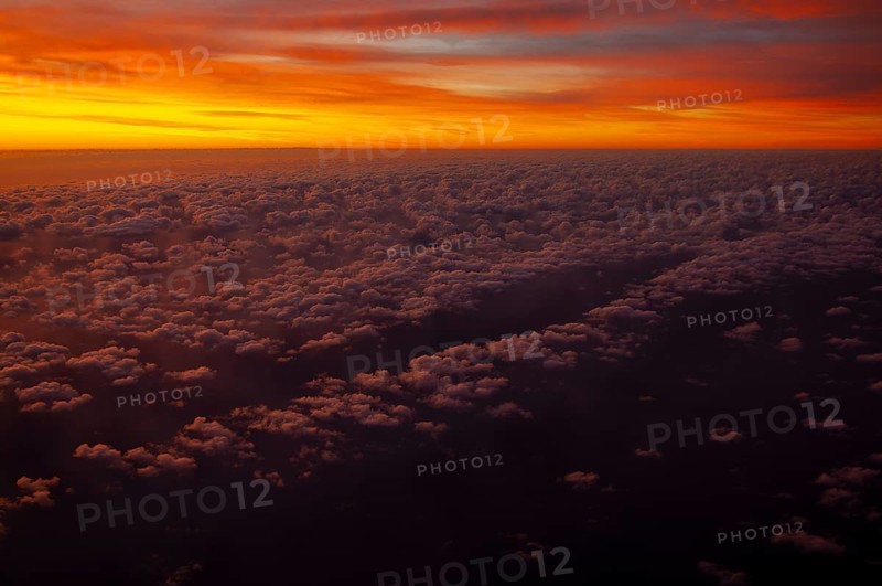 View from airplane window at sunrise