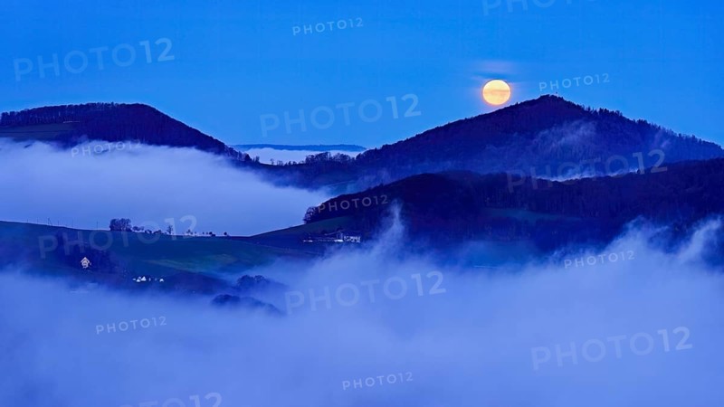 View from the Gisliflue of the Jurassic foothills covered in fog from the left, Asperstrihen, Strihen, in the light of the full moon, Talheim, Canton, Aargau, Switzerland