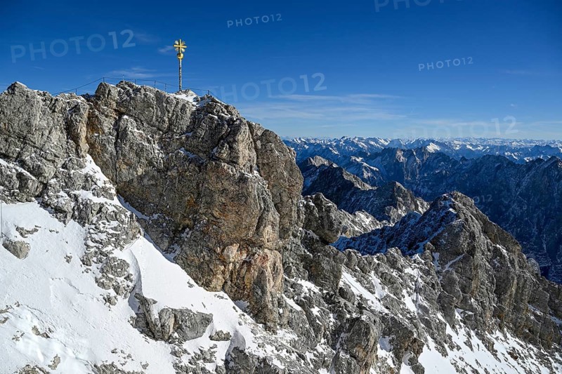 Zugspitze summit cross (2962 m), in the background the Wetterstein Mountains, Grainau municipality, Garmisch-Partenkirchen district, Bavaria, Germany