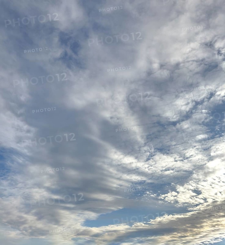 Cloud cover just in front of dusk with linear Altostratus clouds above it Cumulus mediocris with moderate vertical expansion, clouds torn at the right and top Cumulus fractus, international