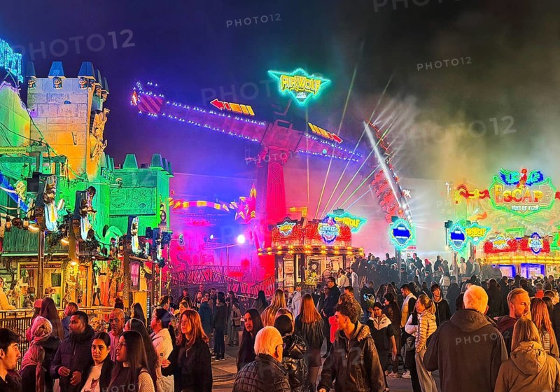Many people at the All Saints Fair at night, the biggest old town fair in Europe, Soest, North Rhine-Westphalia, Germany