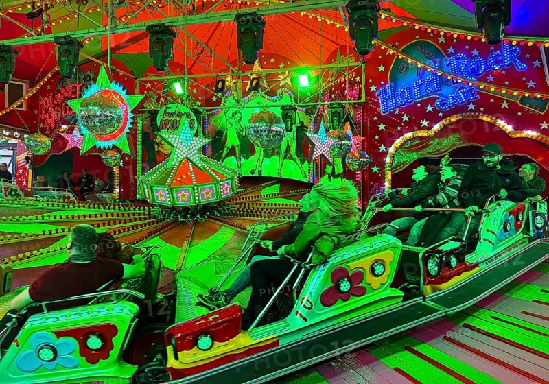 People on the Musik-Express ride at the All Saints Fair, the biggest old town fair in Europe, Soest, North Rhine-Westphalia, Germany