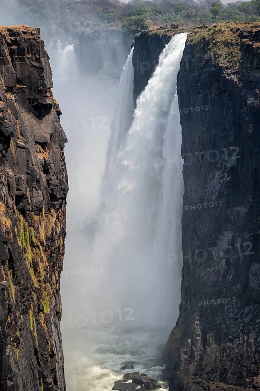 Water plunges into the depths, Victoria Falls with gorge, Zambezi, Zimbabwe