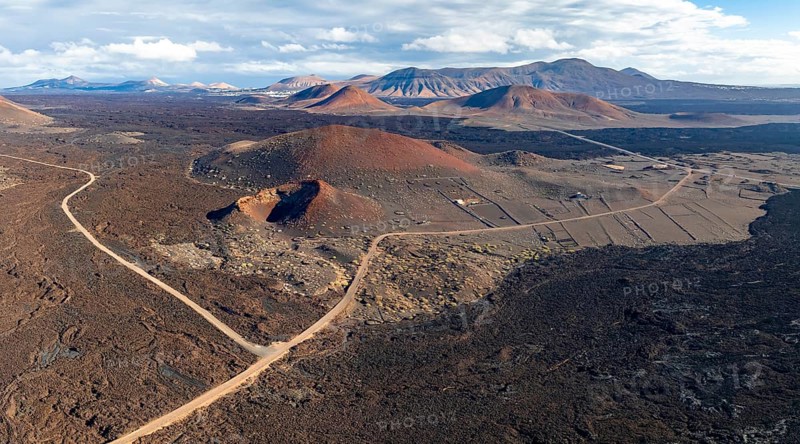 Volcanic landscape with craters and lava fields near El Golfo, aerial view, Lanzarote, Canary Islands, Spain
