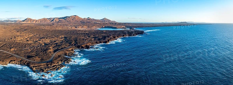 Coast with lava fields, volcanic landscape near Los Hervideros, in the evening light, aerial view, Lanzarote, Canary Islands, Spain