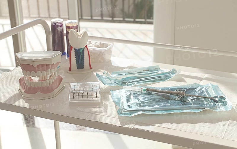 Sterile medical instruments, lying on a tray in protective packaging, dentist's instruments, preparation for a medical procedure