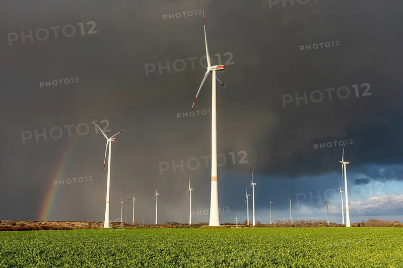 Königshovener Höhe onshore wind farm, on the A44 motorway near Bedburg, in front of the Jackerath triangle, autumn, rainbow, dark rain clouds, recultivated open-cast mining area, Garzweiler open-cast lignite mine, operated by RWE and the city of Bedburg, North Rhine-Westphalia, Germany
