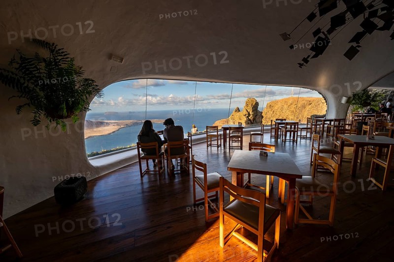 Cafe with panoramic window, interior at the Mirador del Río viewpoint, designed by artist César Manrique, Lanzarote, Canary Islands, Spain