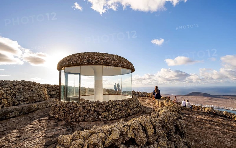 Staircase and viewing platform at the Mirador del Río viewpoint, in the evening light with sun stars, designed by artist César Manrique, Lanzarote, Canary Islands, Spain
