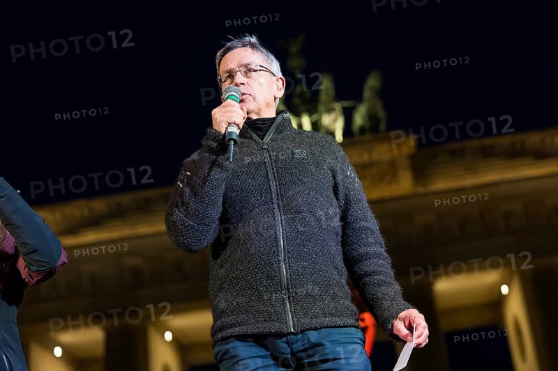 Stefan Rahmstorf (climate researcher at the Potsdam Institute for Climate Impact Research) speaks at the international climate demo under the motto Fight for 1.5 at the Brandenburg Gate in Berlin on 14.11.2025. The demonstration takes place on the occasion of the COP30 World Climate Conference in Belém, Brazil, and to mark 10 years of the Paris Climate Agreement