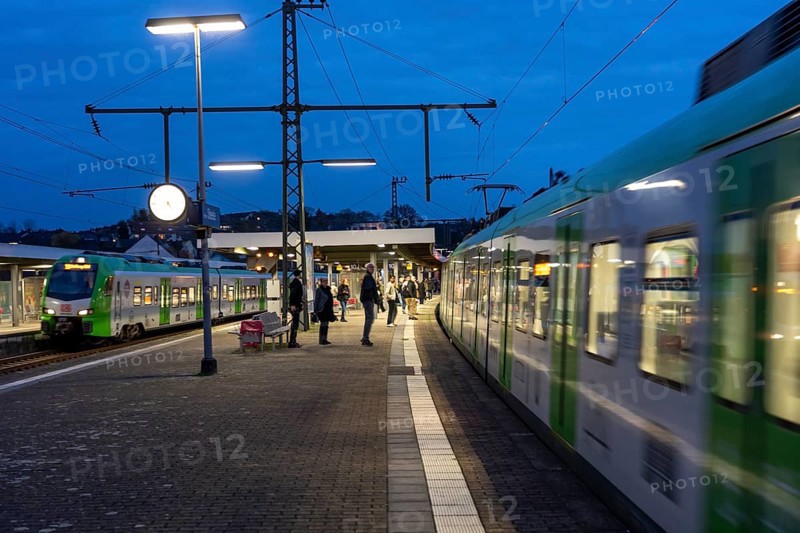Essen-Steele S-Bahn station, passengers waiting for the train late afternoon, in autumn, Essen, North Rhine-Westphalia, Germany