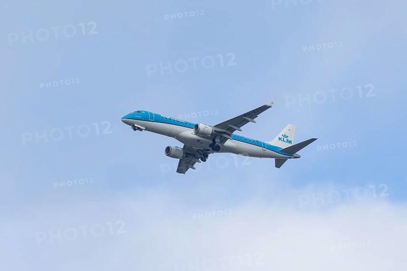 Embraer ERJ-190 jet passenger aircraft of Royal Dutch KLM cityhopper airlines in flight on approach to London city airport, England, United Kingdom