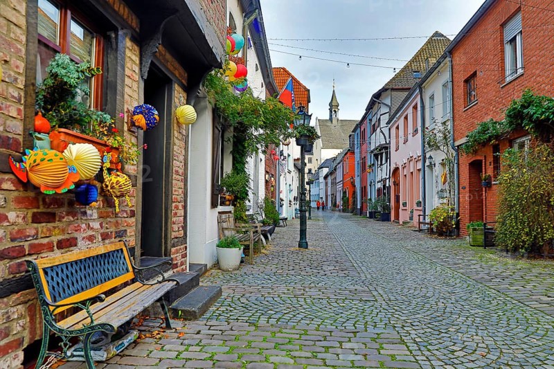 Tiefstraße decorated for Martin's procession with the tower of St. Peter's Church, Kempen, Lower Rhine, North Rhine-Westphalia, Germany
