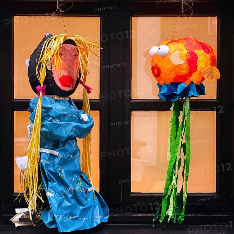 Homemade lanterns for the Martin procession in front of a window in the evening, Old Town, Kempen, Lower Rhine, North Rhine-Westphalia, Germany