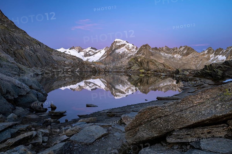 Mount Galenstock is reflected in Bergsee, Grätlisee, Canton of Valais, Switzerland