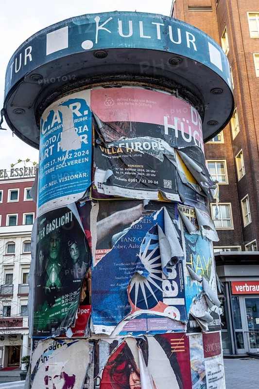 Advertising column for cultural projects, advertising for events, unkempt, torn and exfoliated posters, Essen, North Rhine-Westphalia, Germany