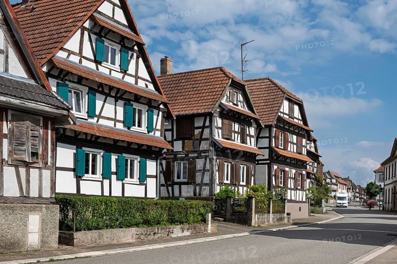 Street with traditional half-timbered houses, Betschdorf pottery village, Alsace, France