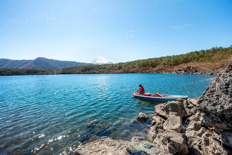 Anglers at Lake Saiko, behind volcano Mt. Fuji, Minamitsuru District, Yamanashi Prefecture, Japan