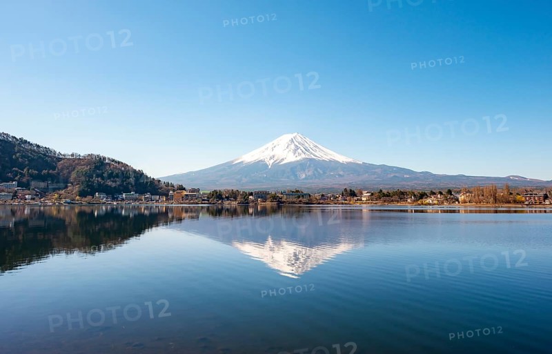 Volcano Mt. Fuji is reflected in Lake Kawaguchi, Yamanashi Prefecture, Japan